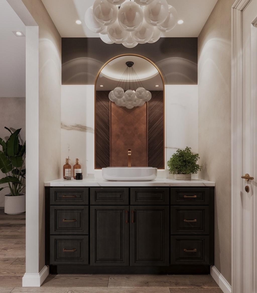 Black shaker vanity with arched brass mirror and fluted bronze paneling