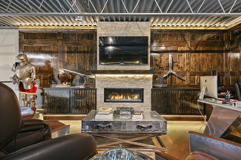 Commercial warehouse lounge with custom millwork