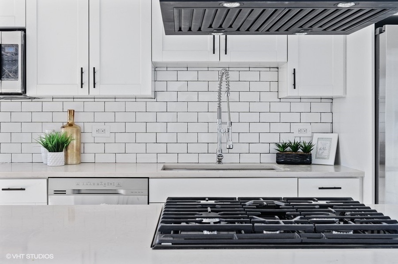 Farmhouse black and white kitchen with subway tile