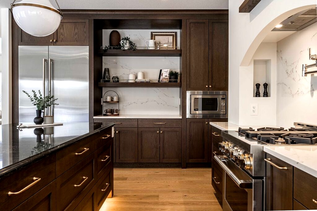Dark wood kitchen with built-in open shelving hutch and marble backsplash